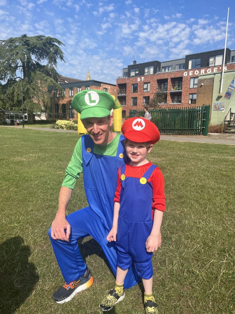 Trowbridge heroes and villains fun run group shot mario and luigi fancy dress