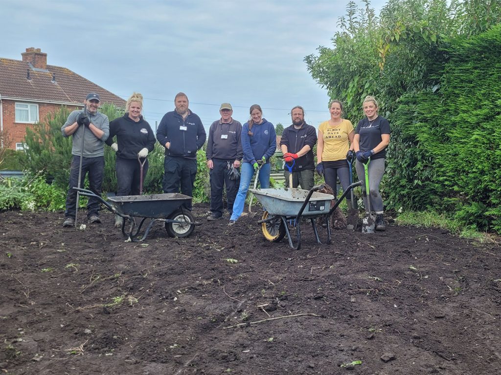 Selwood Housing team after clearing out Bradley Road Community garden.