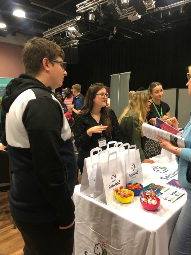 People gathered round Selwood Housing stand at Trowbridge Jobs Fair