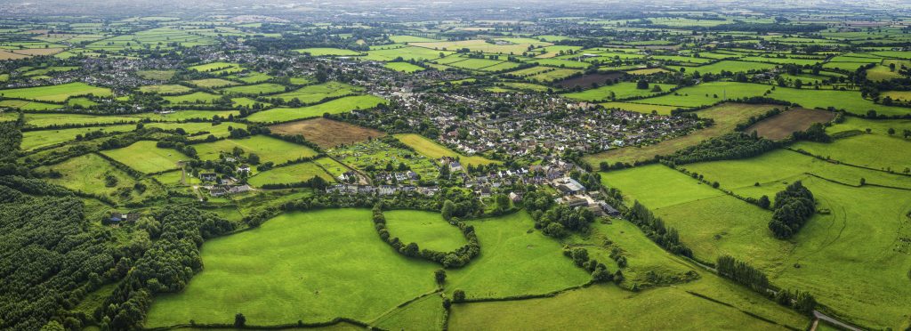 Aerial shot housing and green space in the UK